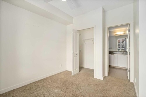 3210-175 Silverado Boulevard Sw, Calgary, AB - Indoor Photo Showing Other Room