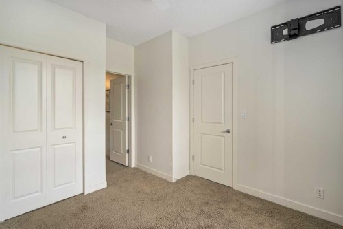 3210-175 Silverado Boulevard Sw, Calgary, AB - Indoor Photo Showing Other Room