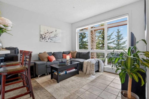 6-108 Rockyledge View Nw, Calgary, AB - Indoor Photo Showing Living Room