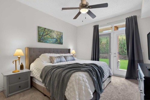 6-108 Rockyledge View Nw, Calgary, AB - Indoor Photo Showing Bedroom