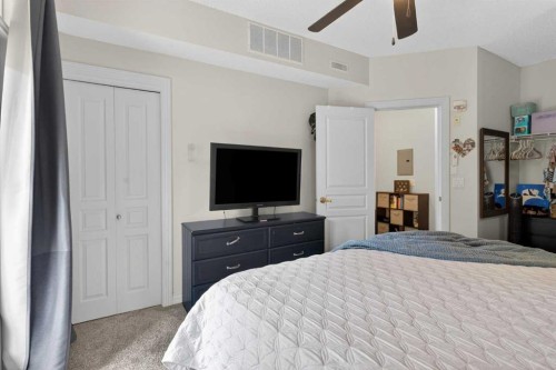 6-108 Rockyledge View Nw, Calgary, AB - Indoor Photo Showing Bedroom