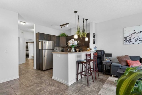 6-108 Rockyledge View Nw, Calgary, AB - Indoor Photo Showing Kitchen With Stainless Steel Kitchen