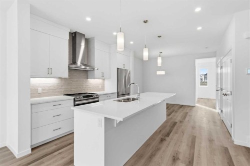 199 Annette Landing Nw, Calgary, AB - Indoor Photo Showing Kitchen With Double Sink With Upgraded Kitchen