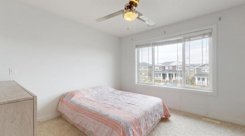 254 Redstone Drive Ne, Calgary, AB - Indoor Photo Showing Bedroom