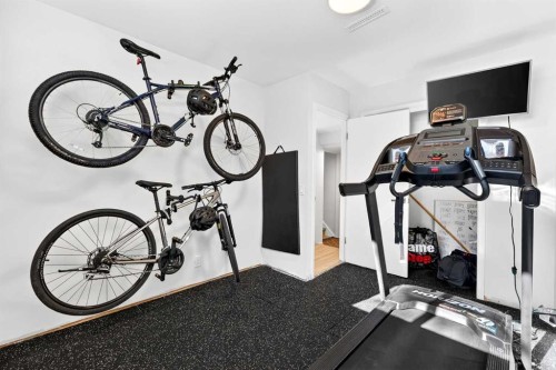 3336 39 Street Sw, Calgary, AB - Indoor Photo Showing Gym Room