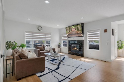 71 Canals Close Sw, Airdrie, AB - Indoor Photo Showing Living Room With Fireplace
