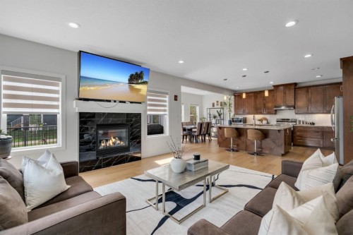 71 Canals Close Sw, Airdrie, AB - Indoor Photo Showing Living Room With Fireplace