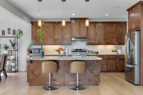 71 Canals Close Sw, Airdrie, AB - Indoor Photo Showing Kitchen With Upgraded Kitchen