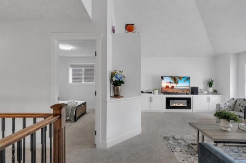 71 Canals Close Sw, Airdrie, AB - Indoor With Fireplace