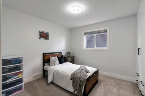 71 Canals Close Sw, Airdrie, AB - Indoor Photo Showing Bedroom