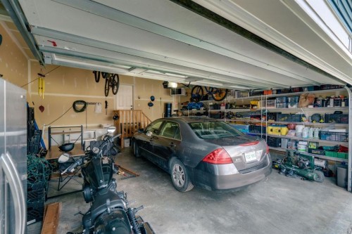 71 Canals Close Sw, Airdrie, AB - Indoor Photo Showing Garage