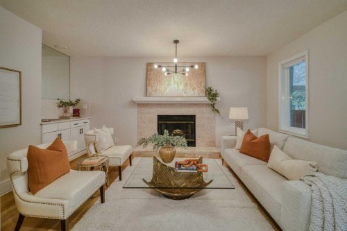 8286 Edgebrook Drive Nw, Calgary, AB - Indoor Photo Showing Living Room With Fireplace