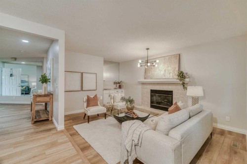 8286 Edgebrook Drive Nw, Calgary, AB - Indoor Photo Showing Living Room With Fireplace