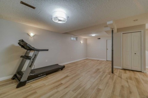 8286 Edgebrook Drive Nw, Calgary, AB - Indoor Photo Showing Gym Room