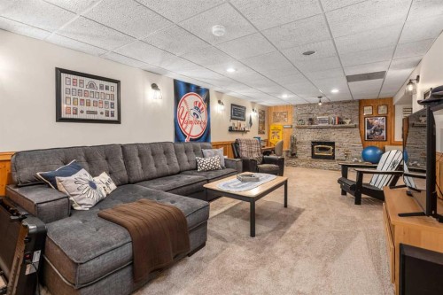 14519 Parkside Drive Se, Calgary, AB - Indoor Photo Showing Living Room With Fireplace