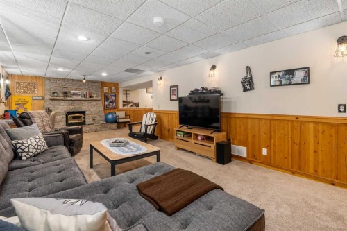 14519 Parkside Drive Se, Calgary, AB - Indoor Photo Showing Living Room With Fireplace