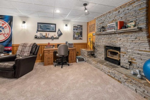 14519 Parkside Drive Se, Calgary, AB - Indoor With Fireplace