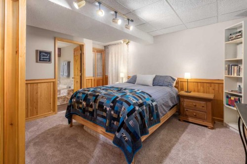 14519 Parkside Drive Se, Calgary, AB - Indoor Photo Showing Bedroom