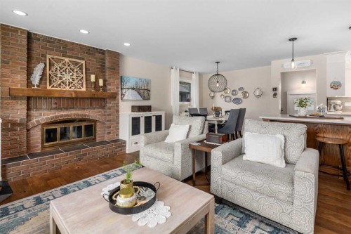 14519 Parkside Drive Se, Calgary, AB - Indoor Photo Showing Living Room With Fireplace
