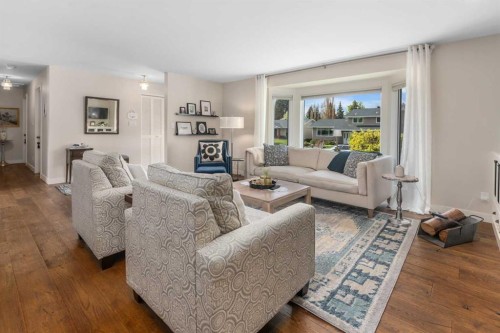 14519 Parkside Drive Se, Calgary, AB - Indoor Photo Showing Living Room With Fireplace