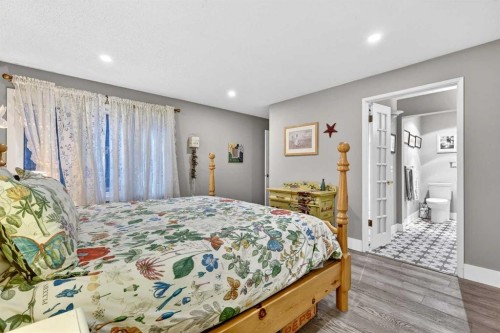 832-860 Midridge Drive Se, Calgary, AB - Indoor Photo Showing Bedroom