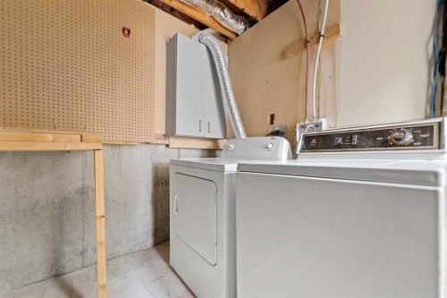 276 Fallswater Road Ne, Calgary, AB - Indoor Photo Showing Laundry Room