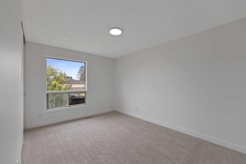 276 Fallswater Road Ne, Calgary, AB - Indoor Photo Showing Other Room