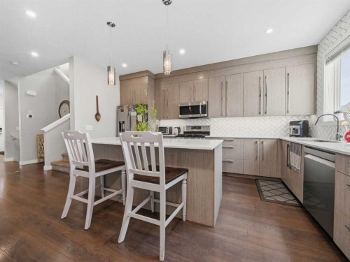 153 Chelsea Drive, Chestermere, AB - Indoor Photo Showing Kitchen With Upgraded Kitchen