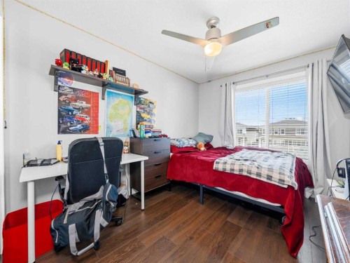 153 Chelsea Drive, Chestermere, AB - Indoor Photo Showing Bedroom