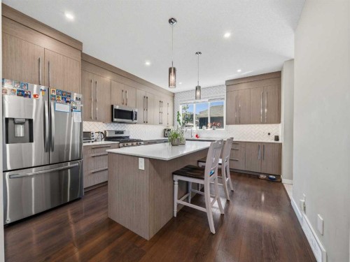 153 Chelsea Drive, Chestermere, AB - Indoor Photo Showing Kitchen With Stainless Steel Kitchen With Upgraded Kitchen