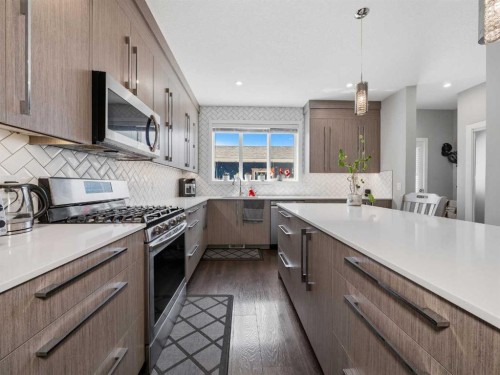 153 Chelsea Drive, Chestermere, AB - Indoor Photo Showing Kitchen With Upgraded Kitchen