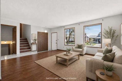 123 Rundleridge Way Ne, Calgary, AB - Indoor Photo Showing Living Room