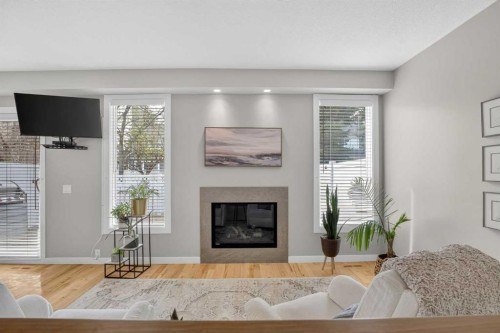 12 Wood Crescent Sw, Calgary, AB - Indoor Photo Showing Living Room With Fireplace