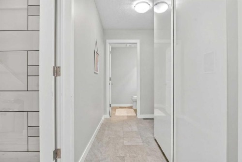 12 Wood Crescent Sw, Calgary, AB - Indoor Photo Showing Other Room