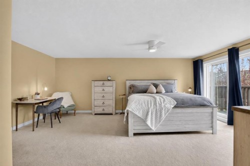 12 Wood Crescent Sw, Calgary, AB - Indoor Photo Showing Bedroom
