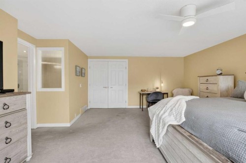 12 Wood Crescent Sw, Calgary, AB - Indoor Photo Showing Bedroom