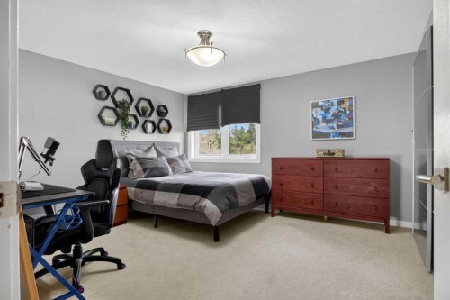 12 Wood Crescent Sw, Calgary, AB - Indoor Photo Showing Bedroom
