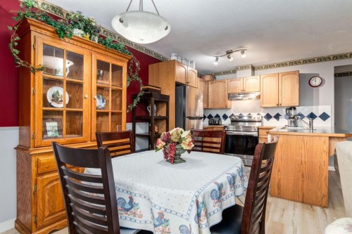 102 Cimarron Trail, Okotoks, AB - Indoor Photo Showing Dining Room