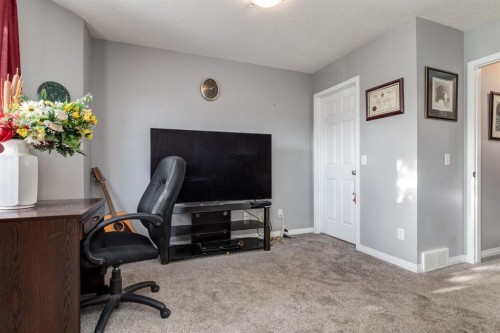 102 Cimarron Trail, Okotoks, AB - Indoor Photo Showing Office