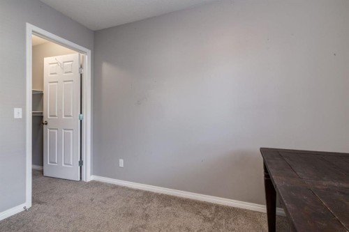 102 Cimarron Trail, Okotoks, AB - Indoor Photo Showing Other Room
