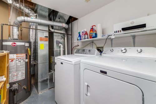 102 Cimarron Trail, Okotoks, AB - Indoor Photo Showing Laundry Room