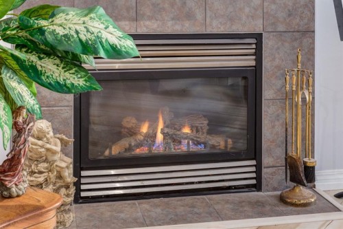 102 Cimarron Trail, Okotoks, AB - Indoor With Fireplace