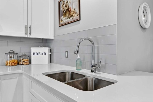 814 Cranbrook Walk Se, Calgary, AB - Indoor Photo Showing Kitchen With Double Sink