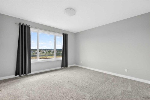 181 Buckskin Way, Cochrane, AB - Indoor Photo Showing Other Room