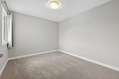 181 Buckskin Way, Cochrane, AB - Indoor Photo Showing Other Room