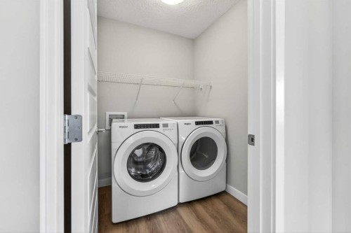 181 Buckskin Way, Cochrane, AB - Indoor Photo Showing Laundry Room