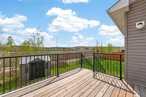 181 Buckskin Way, Cochrane, AB - Outdoor With Deck Patio Veranda With Exterior