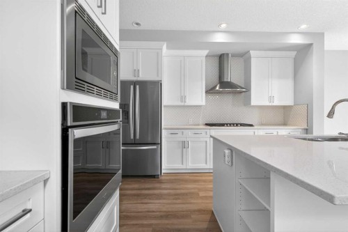 181 Buckskin Way, Cochrane, AB - Indoor Photo Showing Kitchen With Stainless Steel Kitchen With Upgraded Kitchen