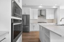 181 Buckskin Way, Cochrane, AB  - Indoor Photo Showing Kitchen With Stainless Steel Kitchen With Upgraded Kitchen 