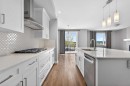 181 Buckskin Way, Cochrane, AB  - Indoor Photo Showing Kitchen With Upgraded Kitchen 